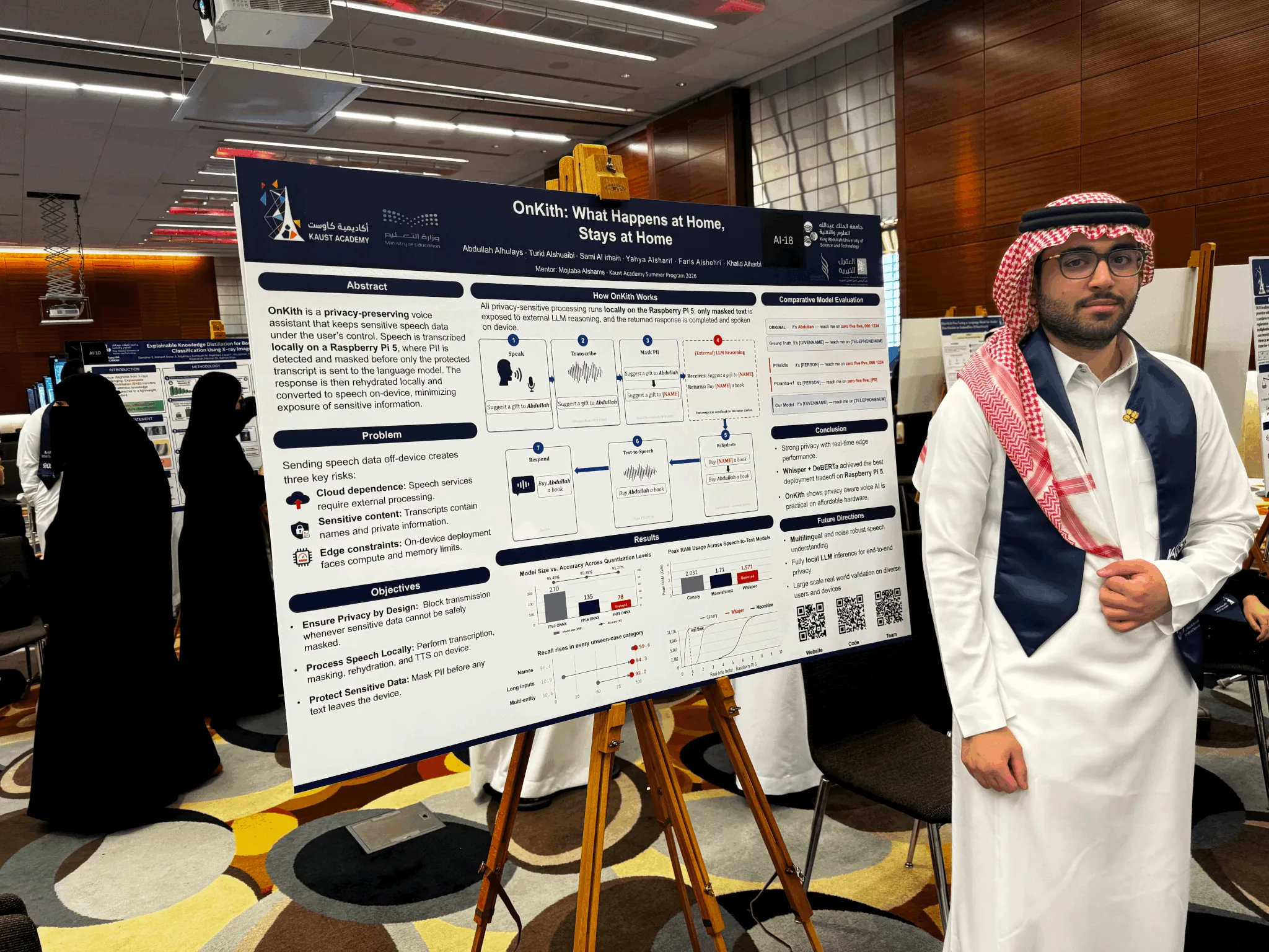 Turki Alshuaibi beside the Onkith poster at the close of the KAUST AI Specialization in Jeddah