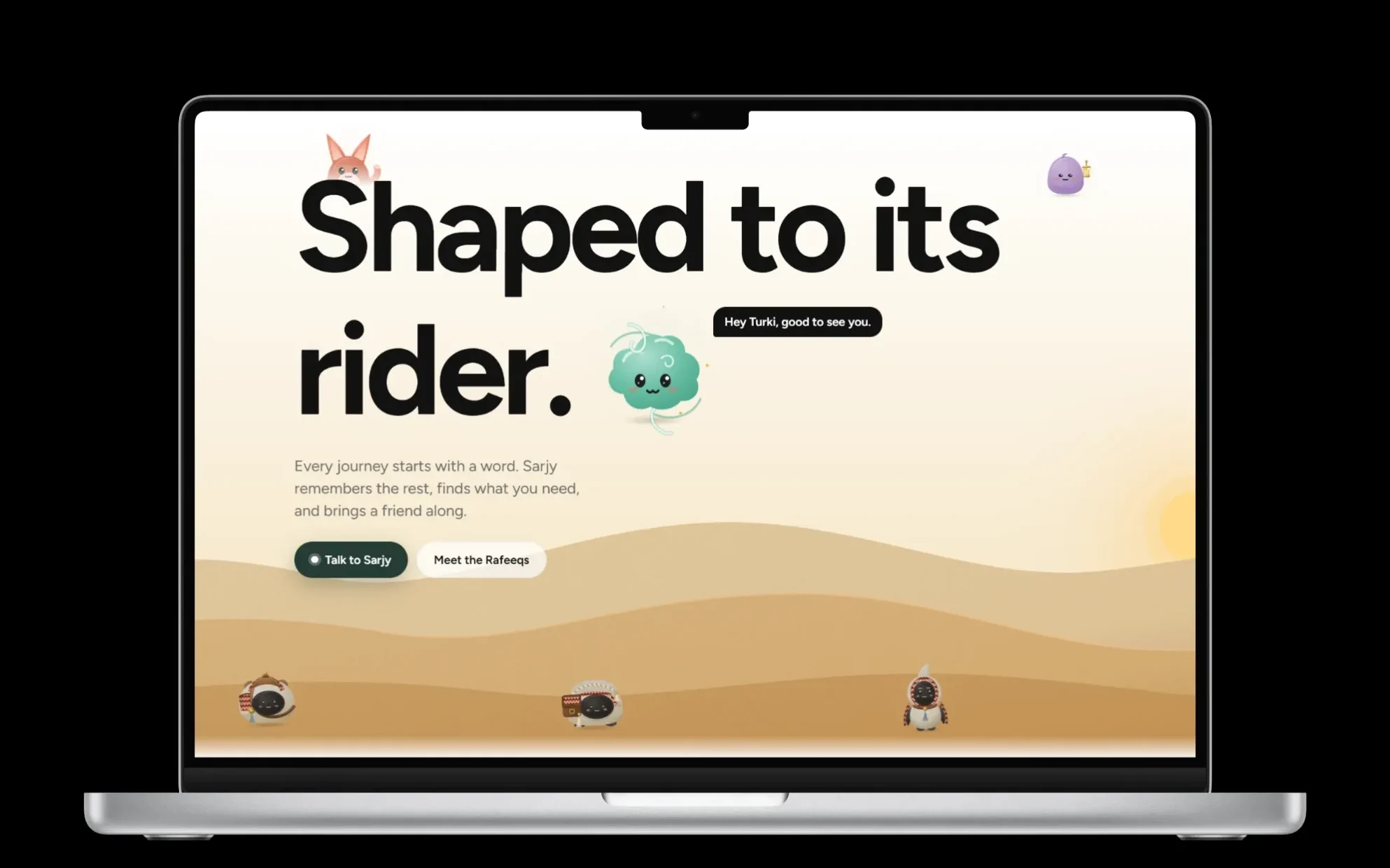 Sarjy on a laptop: the home page, with its Rafeeq characters on the dunes